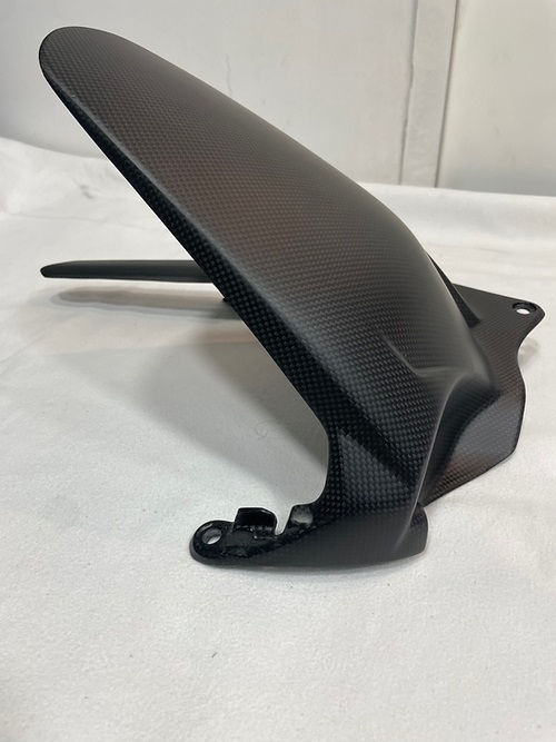 Carbonvani Carbon Fiber Rear Wheel Hugger (fender) for Termignoni Delta Exhaust for Ducati Panigale / Streetfighter V4 (2025+) Carbonvani Carbon Fiber Rear Wheel Hugger (fender) for Termignoni Delta Exhaust for Ducati Panigale / Streetfighter V4 (2025+)